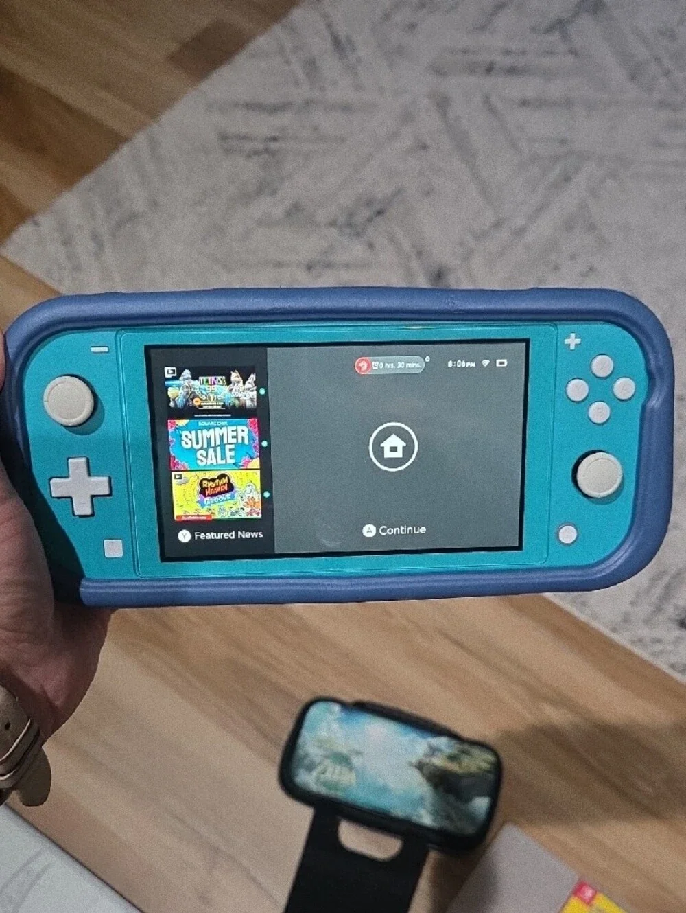 Nintendo Switch Lite Turquoise with Zelda Carry Case and Game Bundle